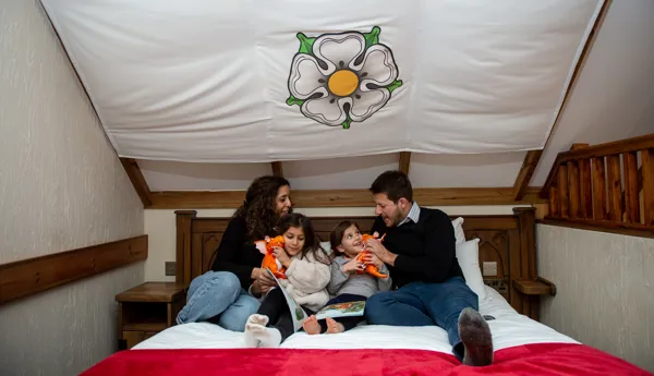 Family on bed